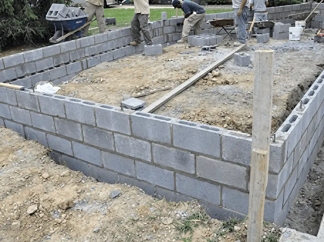 Professionals building a foundation with blocks in Oakland, CA