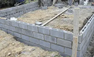 Professionals building a foundation with blocks in Oakland, CA