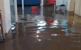 Basement with boiler, cabinets and washing machine completely flooded in Oakland, CA